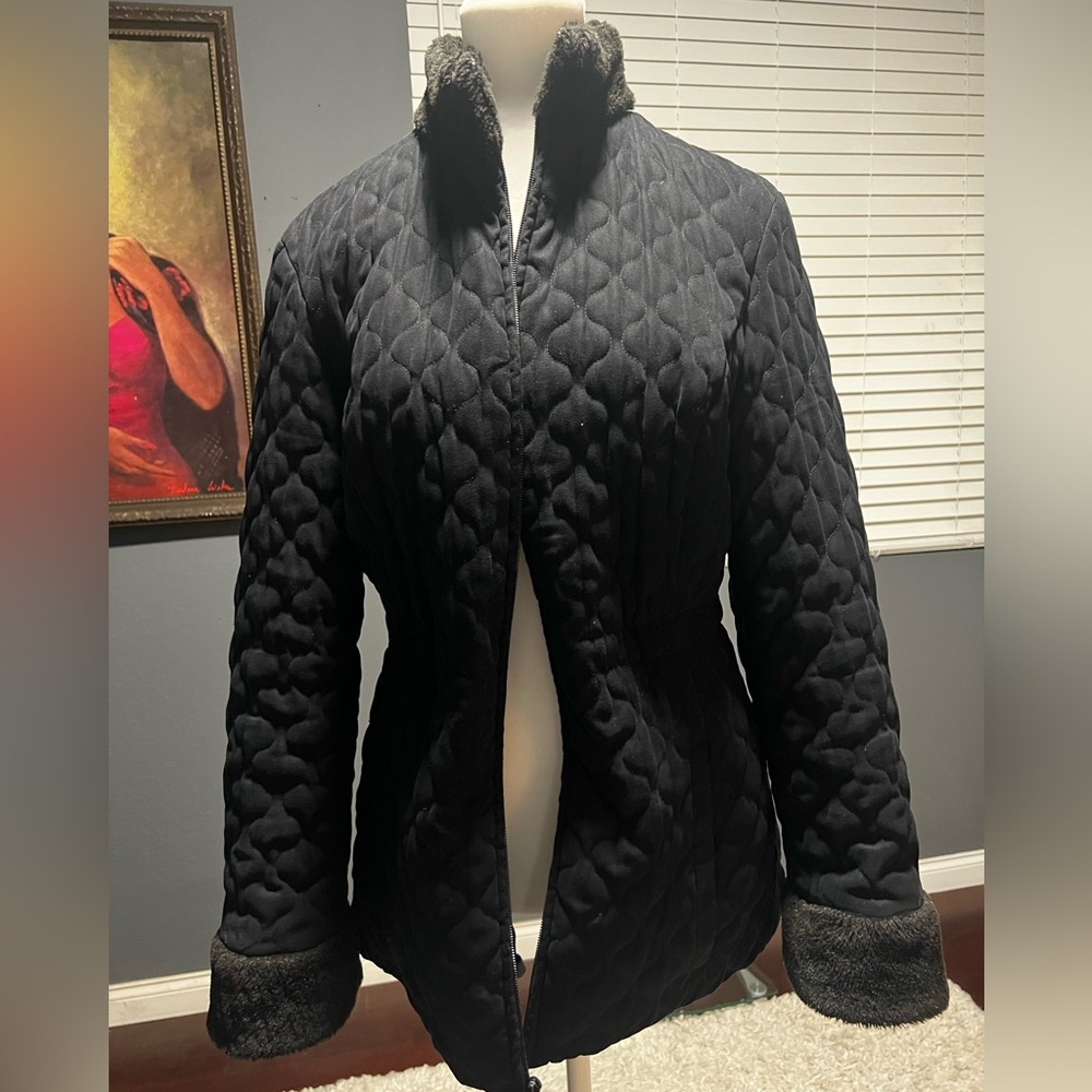 Quilted jacket with faux fur collar and wrist. In Size Small